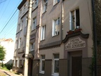 Здание с восстановленными немецкими надписями.