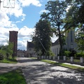Улица в Нестерове, вид на церковь и водонапорную башню.