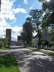 Улица в Нестерове, вид на церковь и водонапорную башню.