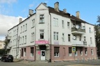 Жилой дом с магазином на пересечении улиц в Нестерове.